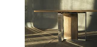 Tonal variations on the tabletop mimic the look of stone. Trovata Dining Table Metal Base Archived Products Joseph Jeup