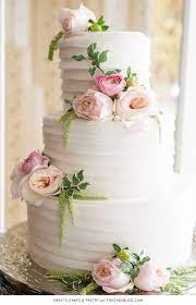 The bride & groom will cut it together, take lots of photos while the guests watch, and then they feed it to each other. 10 Flower Cakes For Spring The Cake Blog