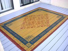 Should You Paint Your Wood Floors Or Is That Blasphemous Painted Wood Floors Painted Porch Floors Painted Rug