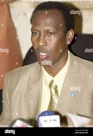 Somalia's Prime Minister Ali Mohamed Gedi addresses a news conference in  Nairobi, Kenya, Saturday, June 18, 2005 informing journalists that he was  returning to Somalia later Saturday to go and establish a