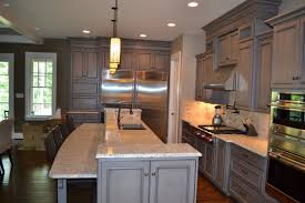 Dw and i do not like stained wood since they can be dark and it so my questions are will glazed cabinets look dated in a few years and are they considered a more formal look? Gray Stained Cabinets With Black Glaze Richmond By Elite Kitchen And Bath Houzz Au