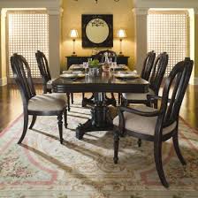 The shape of the pedestal of this black dining table is not as evident, but just by looking at the gloss it has, we are already pretty much bought! Kincaid Sturlyn Solid Wood Rectangular Pedestal Table Dining Set In Onyx Black With Upholstered Chairs By Dining Rooms Outlet