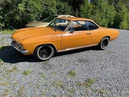 Image result for Sierra Tan 1965 Corvair
