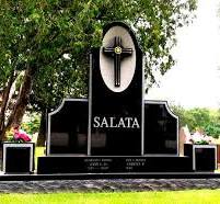 Black granite family monument with bronze cross and custom ...