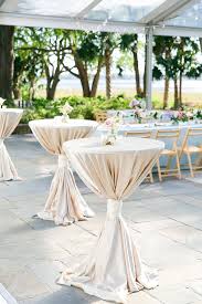 A white linen layered with a turquoise linen, a brown sash, and a sparkling brooch. 110 Cocktail Table Decor Ideas In 2021 Cocktail Table Decor Chair Sash Highboy Table