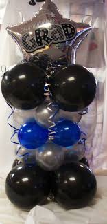 Mini Tower Centerpieces Can Be Any Theme Or Colors This Is A Graduation Creation Graduation Balloons Balloon Centerpieces Balloon Centerpieces Diy