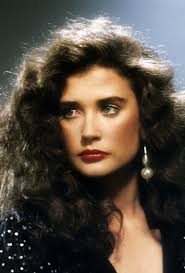 23 iconic '80s hairstyles you need to see. 80s Hairstyles Young Demi Moore With Brown Curly Wavy Big 80s Hair Wearing A Drop Earring In Close Up Image 1980s Hair 80s Hair Vintage Hairstyles