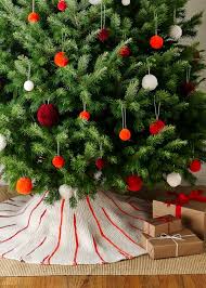 Nothing says christmas like decorations and today we're sharing a collection of crochet christmas tree skirt patterns that you are going to love. Knit Around Tree Skirt Purl Soho