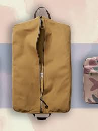 There is a metal hook inside he suit bag which holds on to the hangers. 11 Best Garment Bags So You Never Show Up With Wrinkled Clothes Conde Nast Traveler