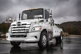 If you already have a gooseneck hitch ball installed in the bed of your truck, you can purchase a 5th wheel hitch that installs in the ball hole of the gooseneck hitch. Hino Exhibits New Xl Series Towing Recovery Trucks Hk Truck Center