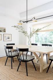 These transitional styled ladder back chairs are the perfect addition to any dining room, having a charming, modern farmhouse twist. Farmhouse Style Black Windsor Dining Chairs For Every Budget Dining Room Industrial Windsor Dining Chairs Dining Room Lighting