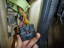 The contact stated that the wiring harness is located on the driver's side door, but the harness is too small to sustain all the wires. 1999 2004 Wj Driver Door Boot Wiring Fix Diy Jeepforum Com