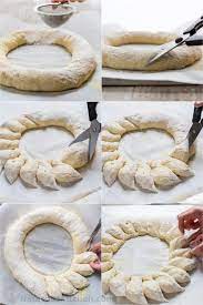 These bread wreaths are made from intertwined pieces of dough with layers of cinnamon and sugar. Wreath Bread Recipe Video Natashaskitchen Com