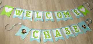 Adorn a set of diy baby bibs with friendly woodland creatures. How To Make A Simple Baby Shower Banner Create And Babble