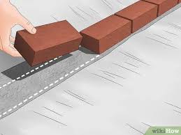 Solid masonry construction is also called 'solid brick', 'double brick', and sometimes 'brick and block'. How To Build A Brick Wall With Pictures Wikihow