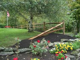 This fence style naturally creates planting opportunities where taller ornamental trees can be centered and surrounded by repeating clusters of similar plants. 20 Beautiful Rustic Home Landscaping Ideas Rustic Landscaping Driveway Entrance Landscaping Fence Landscaping