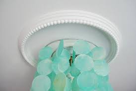 Showing results for ceiling light covers. Covering Cracks Around A Light Fixture With A Ceiling Medallion Young House Love