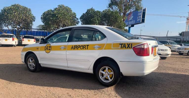 Taxi car used for an airport transfer in Uganda