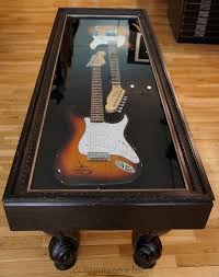 Guitar Case Coffee Table Display Functionality Rolled In One Meubles De Musique Table Basse Originale Chambre De Studio