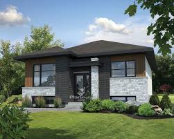 Avec Son Porche Ses Grandes Fenetres Et Son Revetement De Pierres Aux Couleurs Pales Narrow Lot House Plans Empty Nester House Plans Contemporary House Plans