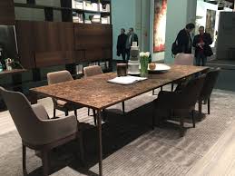 This section of the page contains a carousel that visually displays various linked images one at a time. A Trip Into The World Of Stylish Dining Tables