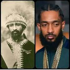 Someone can tell me who is the person with suit and black cap next to the  Emperor? Thanks