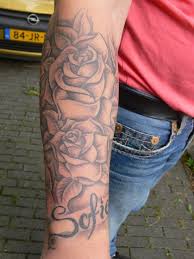 The rose tattoo has been popular for decades dating back to the 1930s. Rose Flower Tattoo Designs For Men