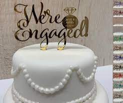 We Re Engaged Cake Topper Personalised Couples Names Etsy Engagement Party Cake Engagement Cake Toppers Engagement Cake Design