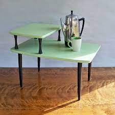 This pair of mid century modern end tables from the artisan collection by bassett, features slightly curved edges, rounded corners and two tiers with a spindled lower storage shelf. Pin By Dee Ann Boydston On For The Home Mid Century Modern Furniture Furniture Tiered End Table