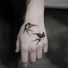 Small Bird Tattoo On Hand 40 Small Bird Tattoo Design Ideas July 2020 Bird Hand Tattoo Swallow Bird Tattoos Fake Tattoos