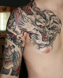 Beeindruckende Dragon Tattoo Designs Ancestry Tattoos Tribal Shoulder Tattoos Meanings Drachen Tattoo Auf Der S Dragon Sleeve Tattoos Tattoos Dragon Tattoo