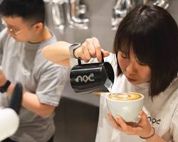 Image of barista making latte art