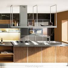 Place island in work triangle near major workspaces like stove and sink. Futuro Futuro 84 Europe Station Island Range Hood