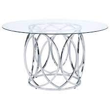 For a sleek, modern appearance, try a glass top dining room set with a clear pane resting on a metal base. Elements International Merlin Contemporary Round Dining Table With Chrome Metal Base And Tempered Glass Top Bullard Furniture Dining Tables