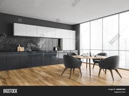 It can be widely used as a dining table to enjoy meals, or for other occasions: Black White Kitchen Image Photo Free Trial Bigstock
