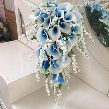 Another traditional wedding bouquet is the classic hand tied bouquet. Cascade Bridal Blue Calla Lilies Bouquet Lily Of The Valley Vanrina