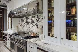 While this design probably won't work in a small kitchen, overly large kitchens with attached dining areas can benefit from an additional island to take up awkward floor space. The Stylish Defining Characteristics Of A Luxury Kitchen