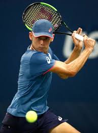 Alex de minaur currently wears the asics solution speed ff. Alex De Minaur Of Australia Returns The Ball During His Men S Singles First Round Match Against Taro Daniel Of Japan On Tennis Clothes Grey Tennis Shoes Tennis
