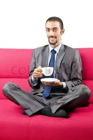 Good morning and welcome to a very cool, cool roundabout. Man Sitting On The Sofa Stock Image Colourbox