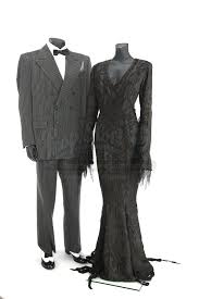 The addams family was a satirical inversion of your typical american family of the time. The Addams Family 1991 Addam S Family Values 1993 Morticia Addams Anjelica Huston And Gomez Addams Raul Julia And Signature Costumes Current Price 11000