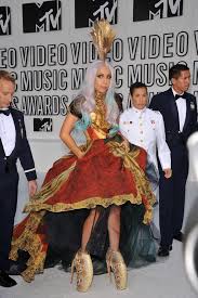 Gaga experimented with her style for the red carpet of the 2009 mtv vmas with a period outfit. Lady Gaga S Most Iconic Red Carpet Outfits Of All Time