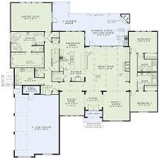 European Style House Plan 4 Beds 4 Baths 3766 Sq Ft Plan 17 2477 House Plans And More Monster House Plans House Floor Plans Faced in both brick and siding, the exterior is enhanced by flower boxes and a covered entry topped by an arched window.