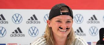 Alexandra Popp wears fake mustache for media gag