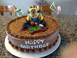 Use the butter cream to sandwich the cakes together and to spread onto the body of the minion, using a pallet knife as smoothly as possible. Minionsports Birthday Cake 12 Inch Chocolate Cake With Chocolate Buttercream Frosting Minion Amp Decorations Are All Editable Amp Made Cakecentral Com