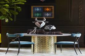 A removable 51 cm leaf extends the table to comfortably seat up to 10. Jonathan Adler Decony