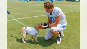 Here is a picture of me (about 30 years ago) with cesar. Nfl Dogs At Practice And On The Field