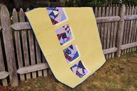 Make a memory quilt from your loved one's clothes. How To Make A Memory Quilt Tutorial And Pattern
