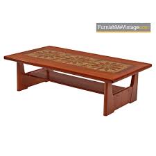 This is a simplistic coffee table with solid wood legs structure and lifts function. Danish Coffee Table By Brdr Furbo Stone Tile Inlaid Teak
