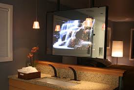 The dialogue between the palette and textures, complementing and emphasizing the. Vanity Mirror Tv Vanishing Television For Your Bathroom