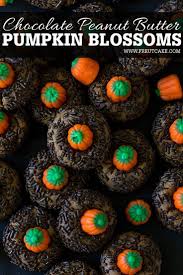 Chocolate Peanut Butter Pumpkin Blossoms Are The Perfect Halloween Cookie Classic Peanut B Peanut Butter Blossom Cookies Blossom Cookies Peanut Butter Pumpkin